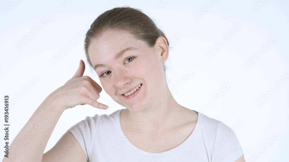Call me Gesture by Redhead Woman, White Background Call me Gesture by Redhead Woman, White Background