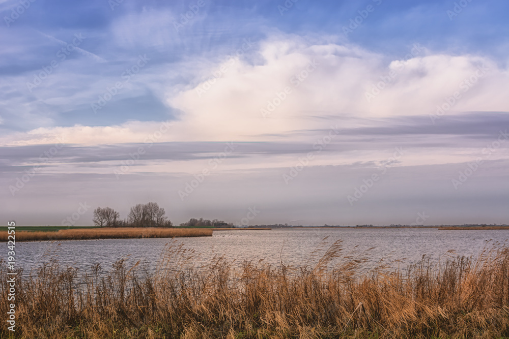Typical flat Dutch polder with its ditches and lakes