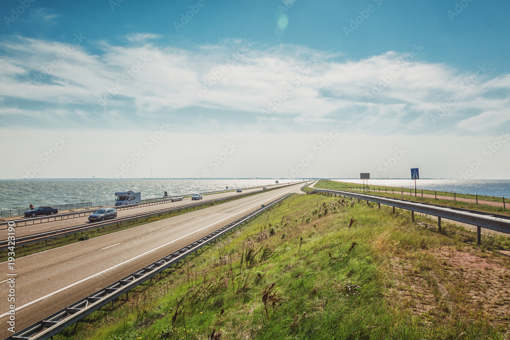 The Afsluitdijk is the thirty-two kilometer long connection between the Dutch provinces of North Holland and Friesland
