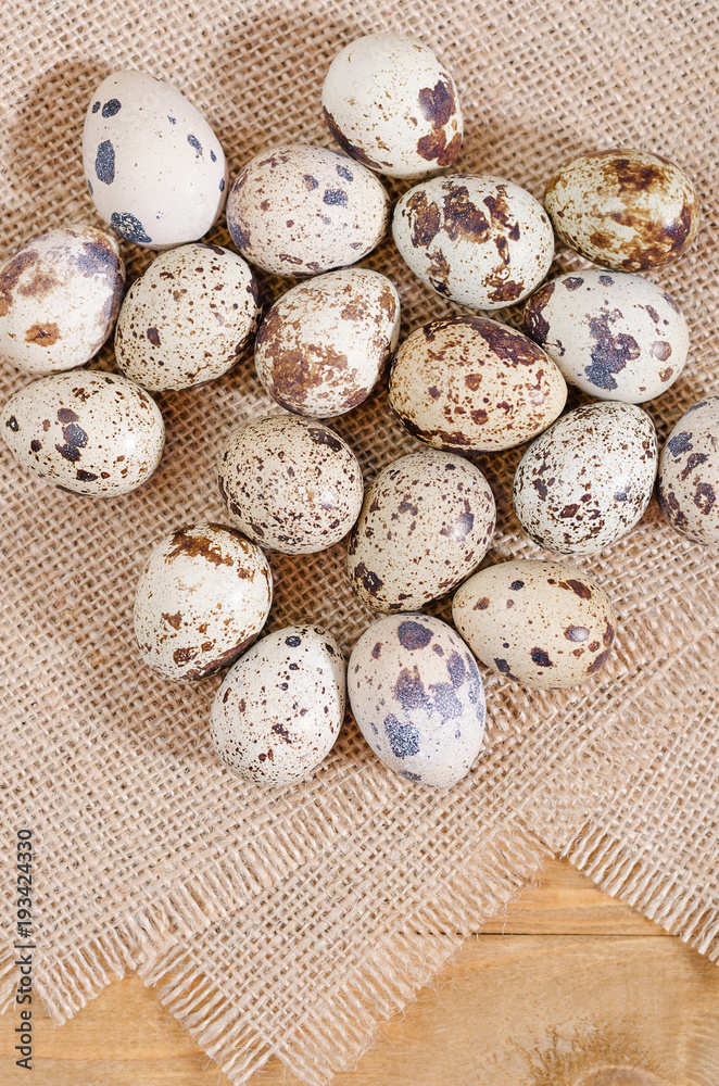quail eggs on rustic wooden background quail eggs on rustic wooden background