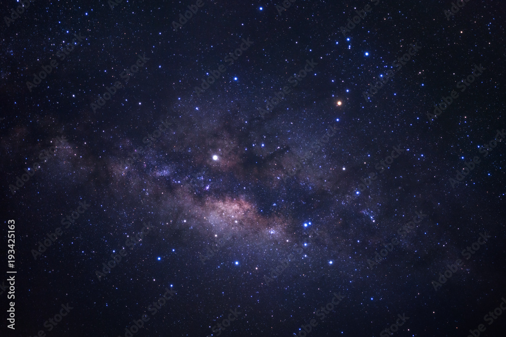 Fototapeta premium Milky way galaxy with stars and space dust in the universe, Long exposure photograph, with grain.