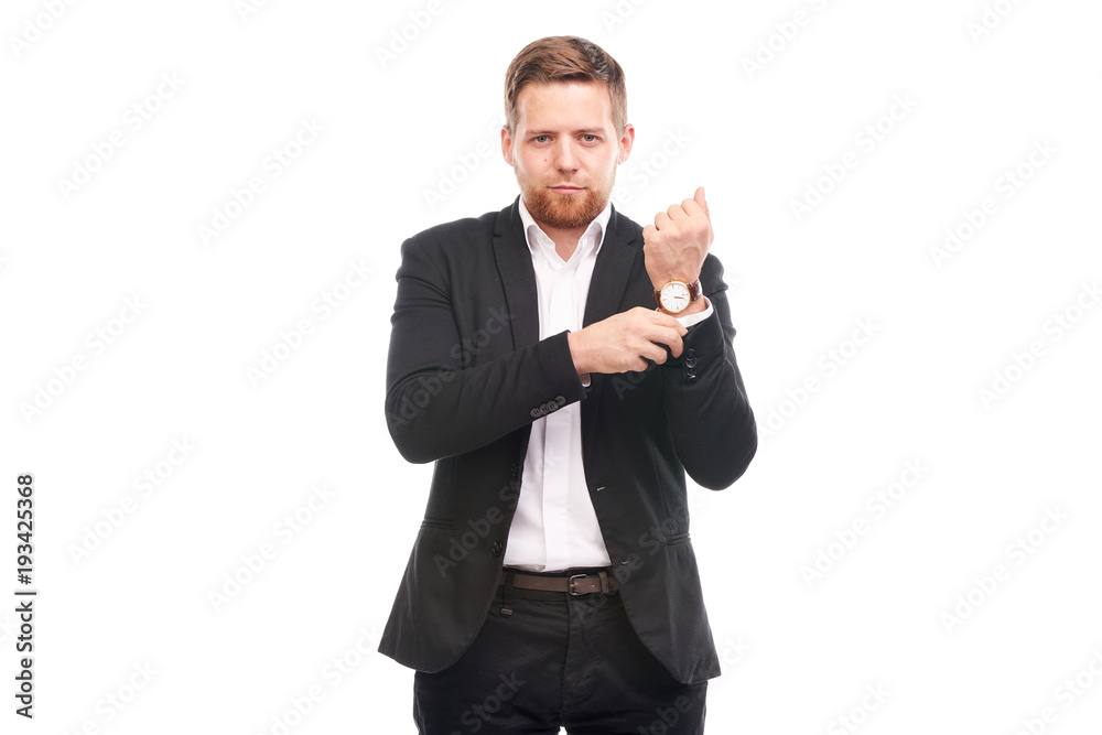 Portrait of young Caucasian businessman in black suit and white shirt posing on white background Portrait of young Caucasian businessman in black suit and white shirt posing on white background