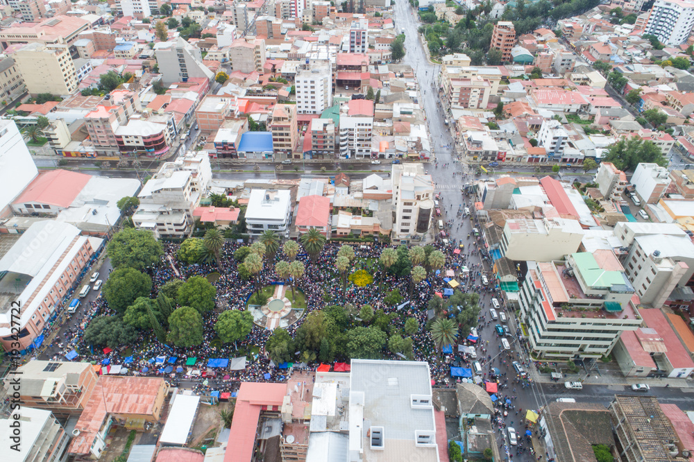 People gather in the Plaza Bush in Cochabamba, Bolivia