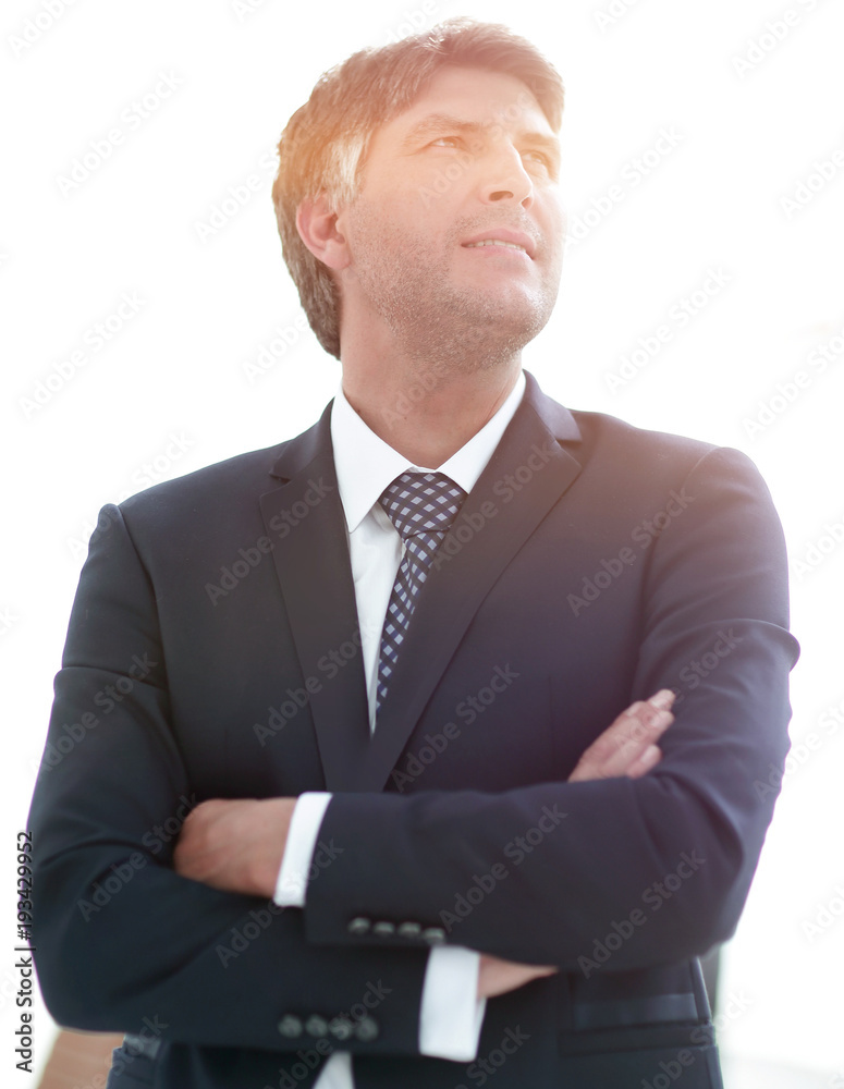 Photo of an attractive businessman with his arms crossed Photo of an attractive businessman with his arms crossed