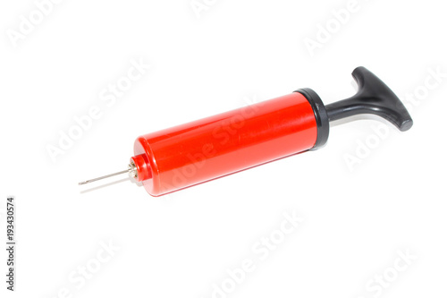 The pump to inflate balls on a white background.