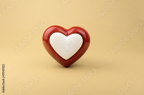 Red heart on yellow background
