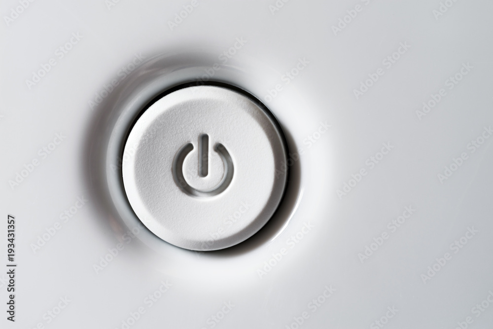 The power button is white. Volumetric white standby-button with shadows. The power button is white. Volumetric white standby-button with shadows.