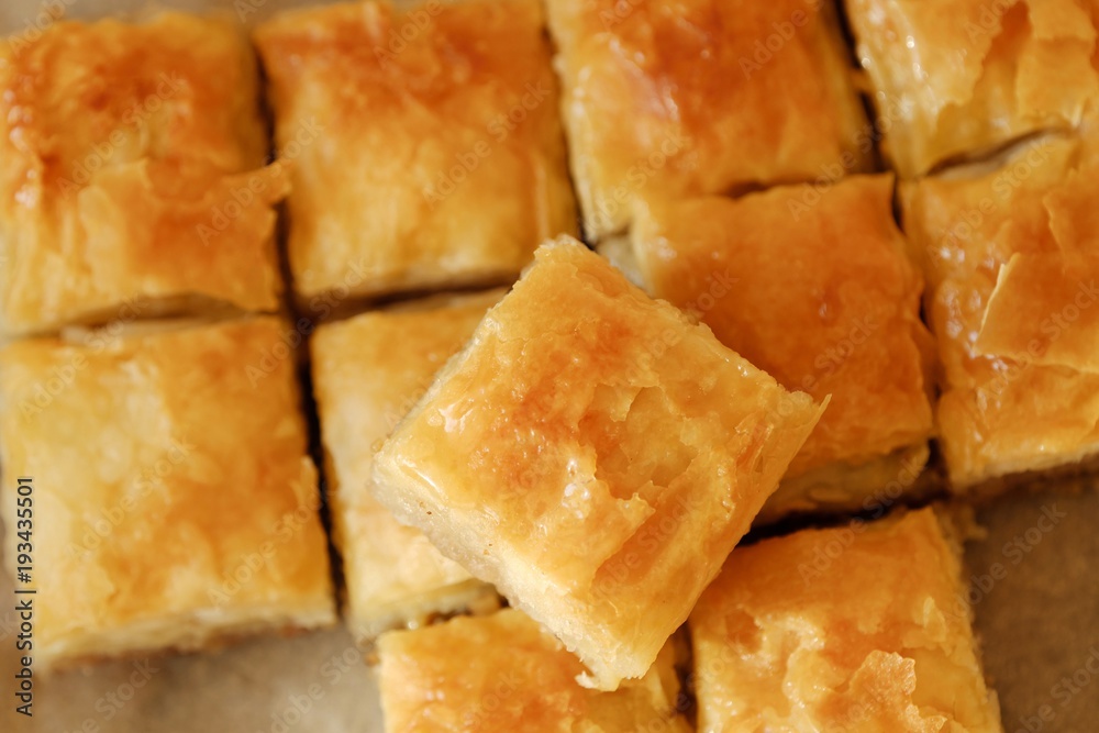 Delicious baklava dessert with nuts and honey Delicious baklava dessert with nuts and honey