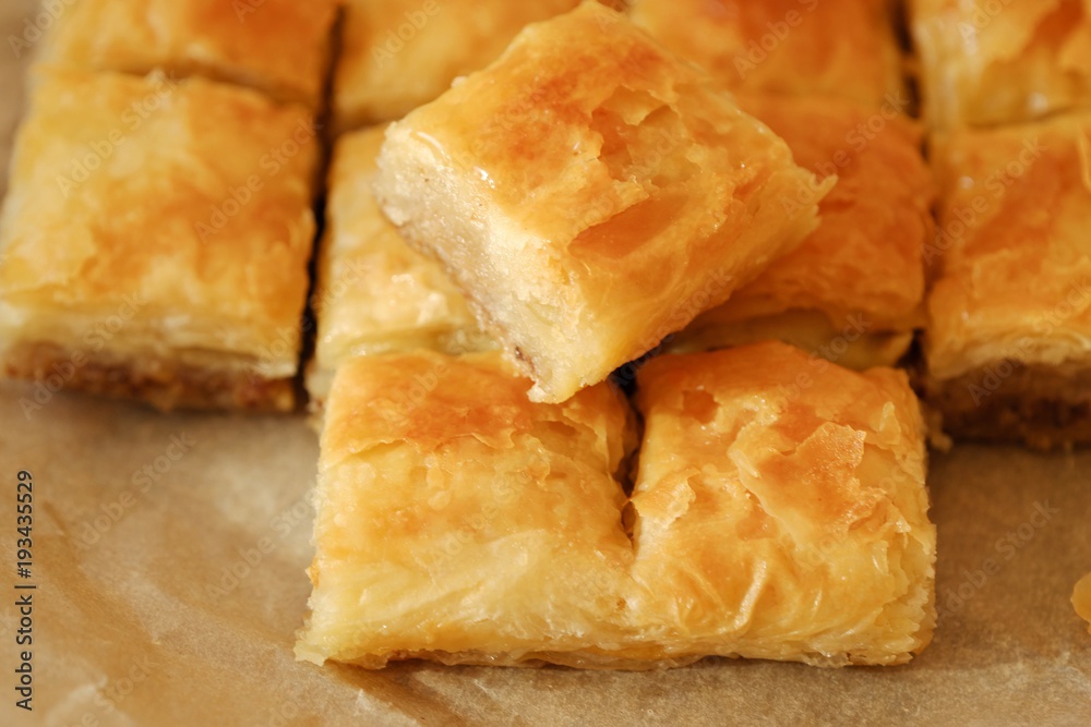 Delicious baklava dessert with nuts and honey Delicious baklava dessert with nuts and honey