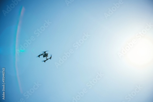 Soaring in the blue sky quadrocopter © volurol