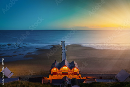 Clifftop view of Pier at twilight time of Saltburn by the Sea, North Yorkshire, UK. Vintage tone