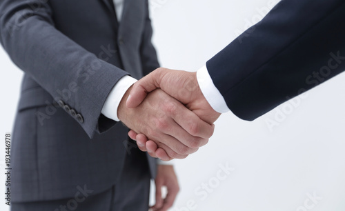 Businessman by handshake invites to cooperation. © ASDF