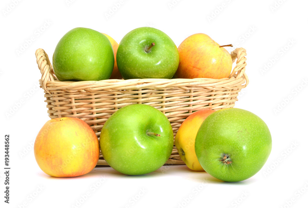 Red and green apples in basket on white background Red and green apples in basket on white background