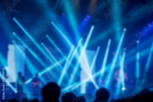 Blurred background : Bokeh lighting in outdoor concert with cheering audience