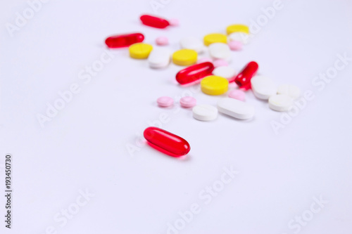 medical tablets different on color from various illnesses. Colour pills with space for your text