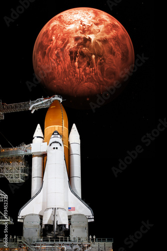 Fototapeta Naklejka Na Ścianę i Meble -  Space shuttle taking off on a mission. Elements of this image furnished by NASA.