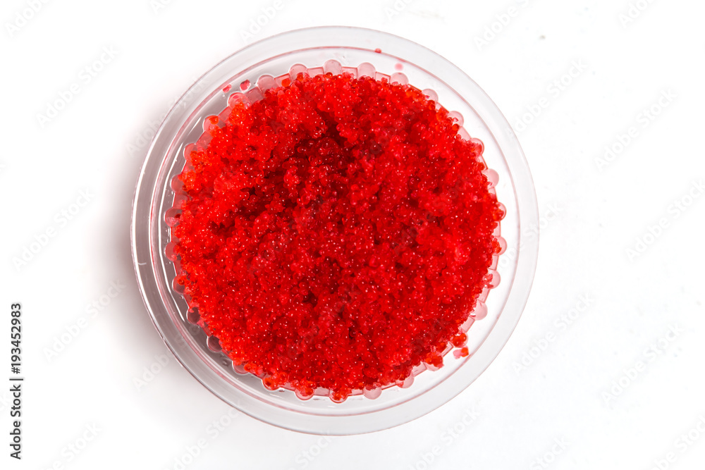 red caviar salmon in a jar on a white background red caviar salmon in a jar on a white background