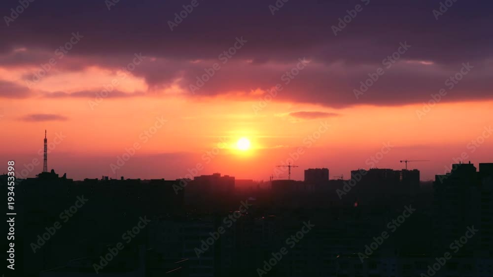 time lapse sunset and silhouette crane working in construction site time lapse sunset and silhouette crane working in construction site