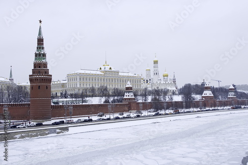 Russia. Moscow Kremlin in winter. On the river in Moscow the ship breaks the ice. 