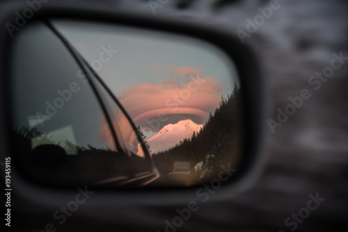 Lenticular cloud over Mt Hood at sunset from a car mirror © Nicholas Steven
