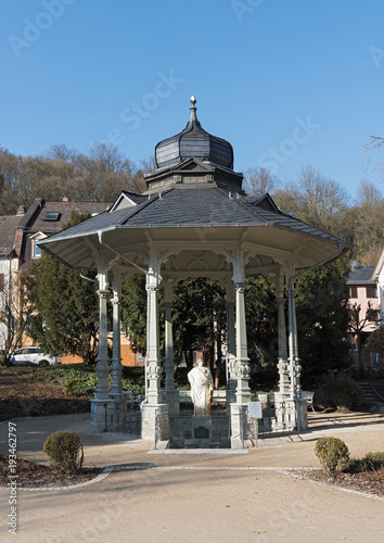 Sodenia pavilion with statue in the Quellenpark of Bad Soden am Taunus, Hesse, Germany photo