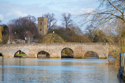 Typical English river scene with church and bridge