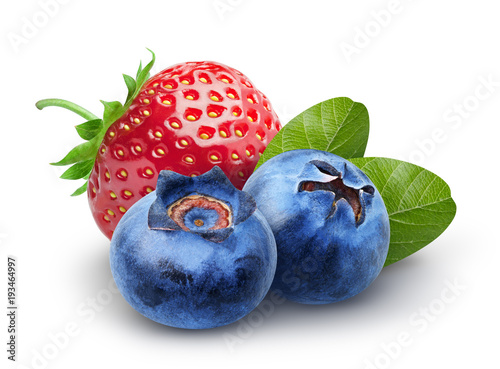 Isolated berries. Two sweet blueberry and strawberry fruits with leaves isolated on white background, clipping path