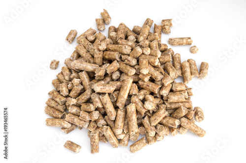 little pieces of pellet on white background