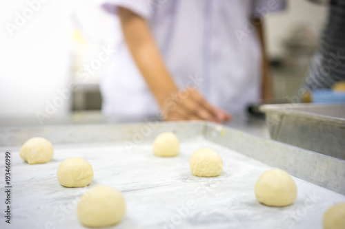 The chef are cutting and molding dough.