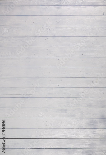 fresh white paint on wooden surface, background of white wooden boards