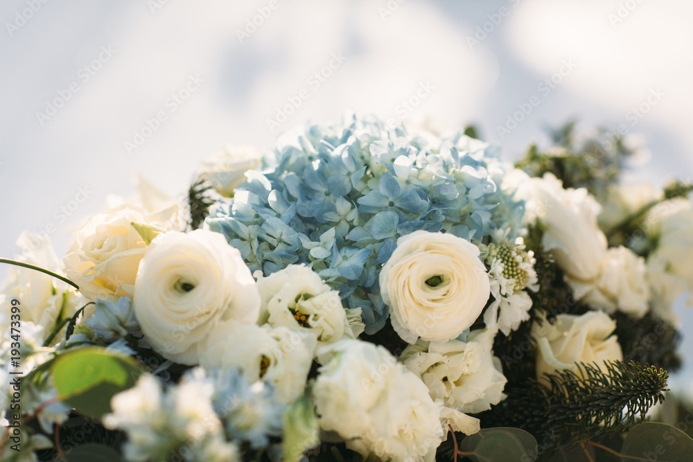 Beautiful flowers and decoration on table in wedding day, winter