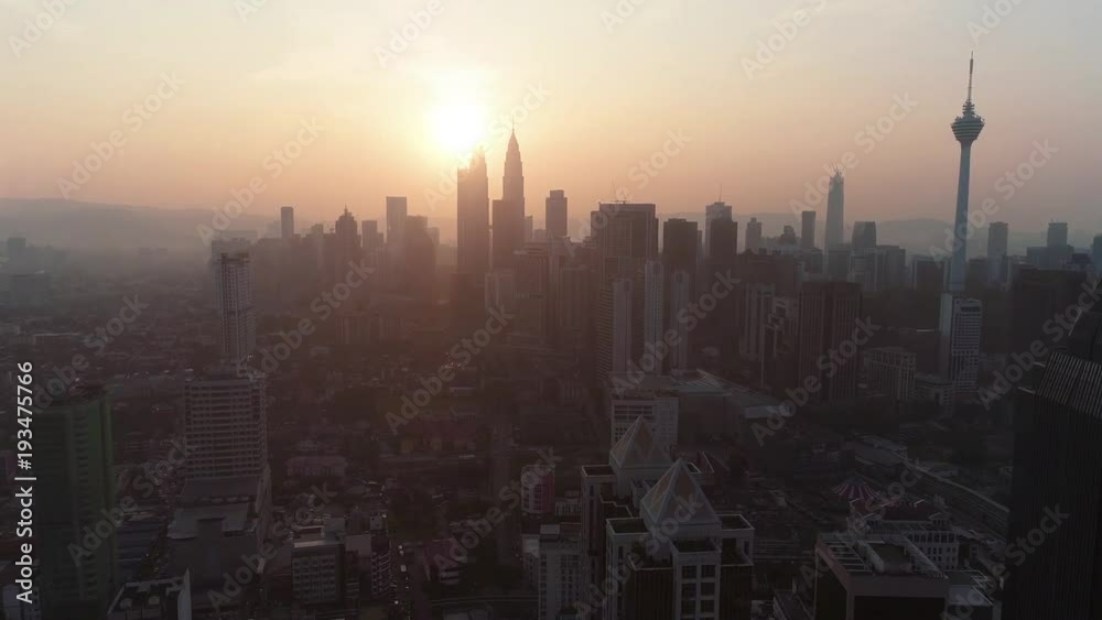 Aerial view of Kuala Lumpur city in Malaysia capital, tall buildings. Cinematic video of skyscrapers in big City. Aerial view of Kuala Lumpur city in Malaysia capital, tall buildings. Cinematic video of skyscrapers in big City.