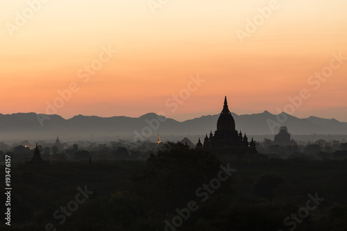 Silhouette of the ancient temples in the archaeological park in Bagan before the sunrise, Myanmar