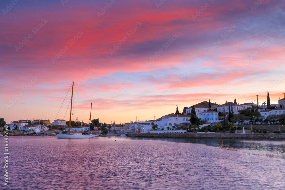 Yacht in the harbour of Spetses village, Greece. 
