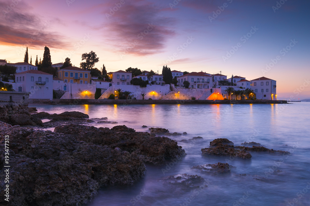 Evening view of Spetses village from the beach, Greece. 
