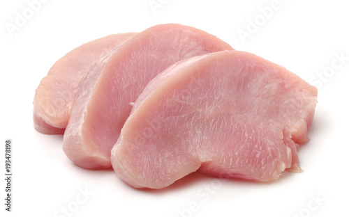 Slices of raw turkey meat fillet