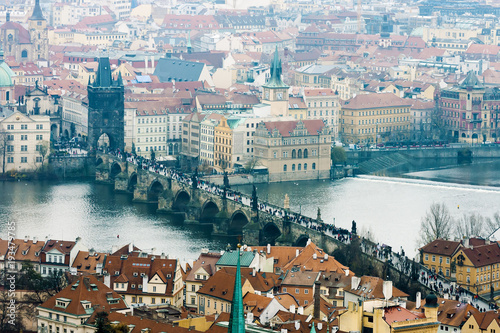 Panorama of Charles Bridge from above on rainy day