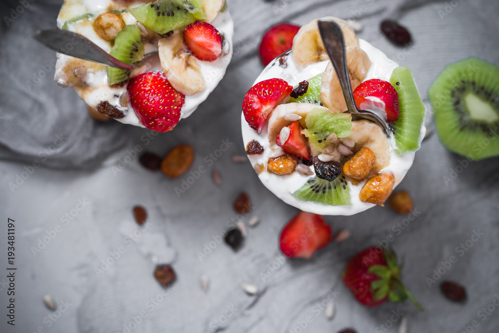 Nutrition Yoghurt fruit dessert strawberries banana kiwi raisins sunflower seeds oatmeal walnuts caramel Nutrition Yoghurt fruit dessert strawberries banana kiwi raisins sunflower seeds oatmeal walnuts caramel