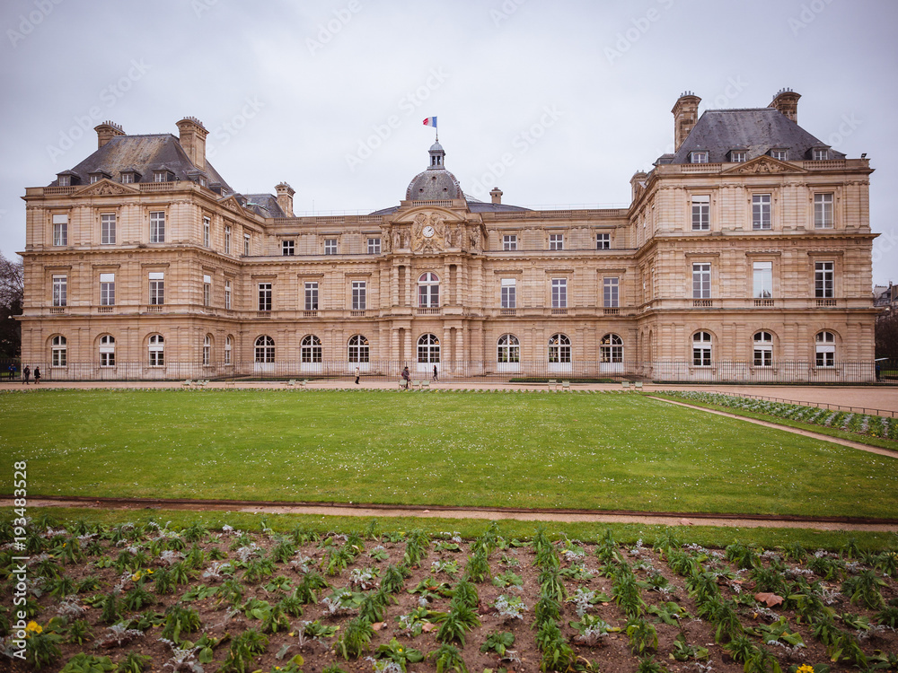Fototapeta premium View of the Luxembourg palace, inside the public garden of Luxembourgh, one of the largest in Paris.