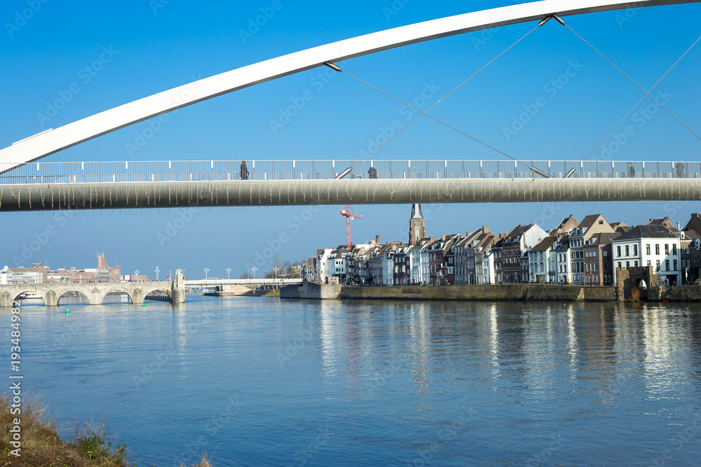 Fototapeta premium Pedestrian bridge over river Maas