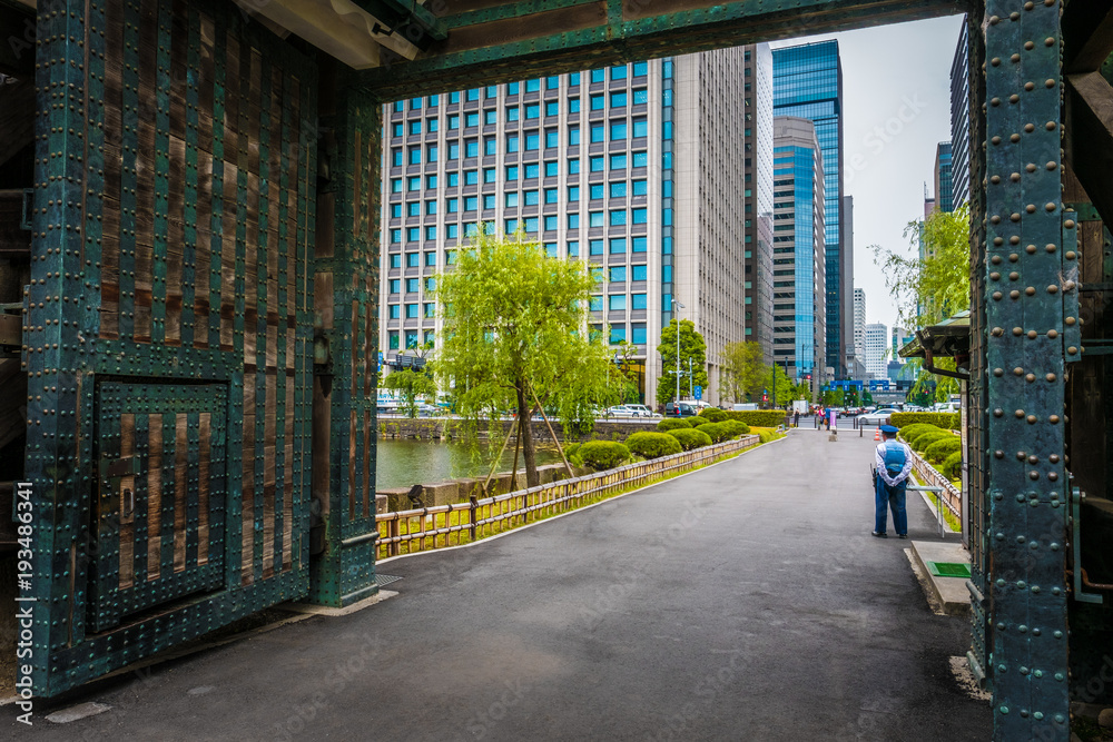 Beautiful Imperial old palace/castle building in tokyo japan, view from castles gate to modern district Beautiful Imperial old palace/castle building in tokyo japan, view from castles gate to modern district