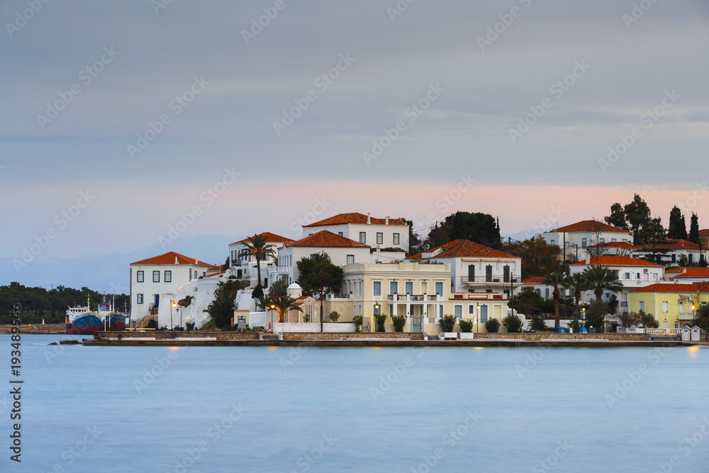 Evening view of Spetses village from the harbour pier, Greece. 
