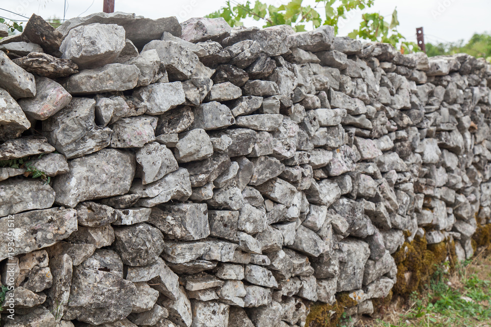 Fence made of stone. Montenegro. 