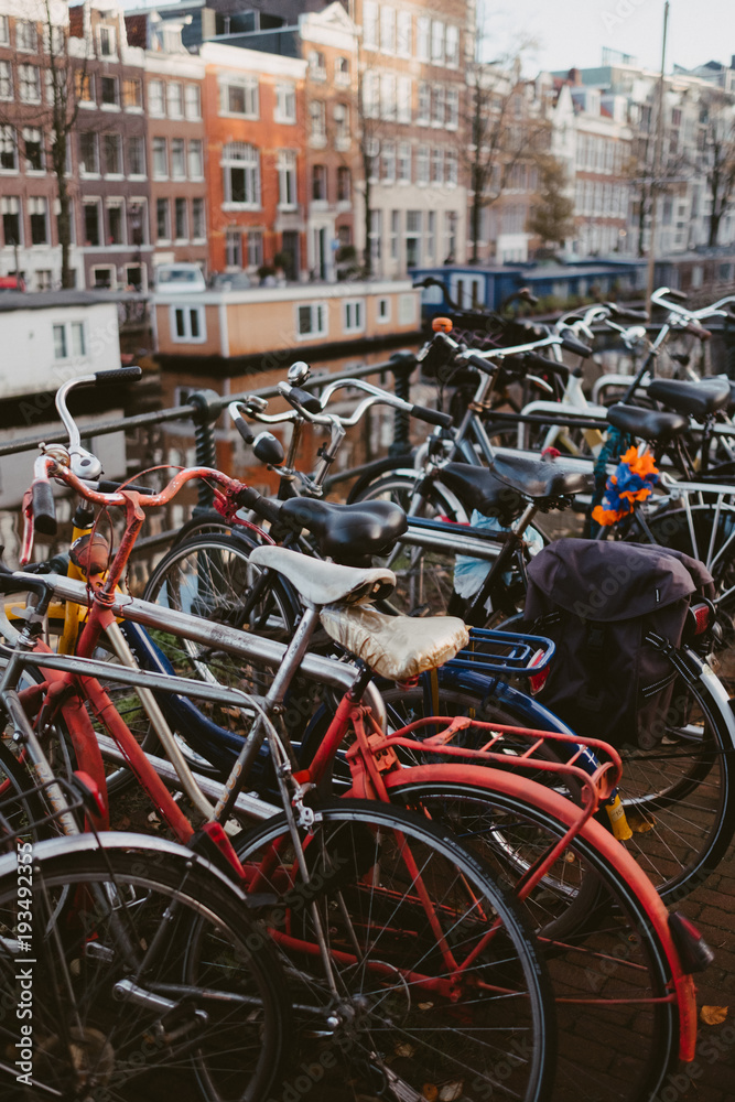rows of bikes on an amsterdam canal