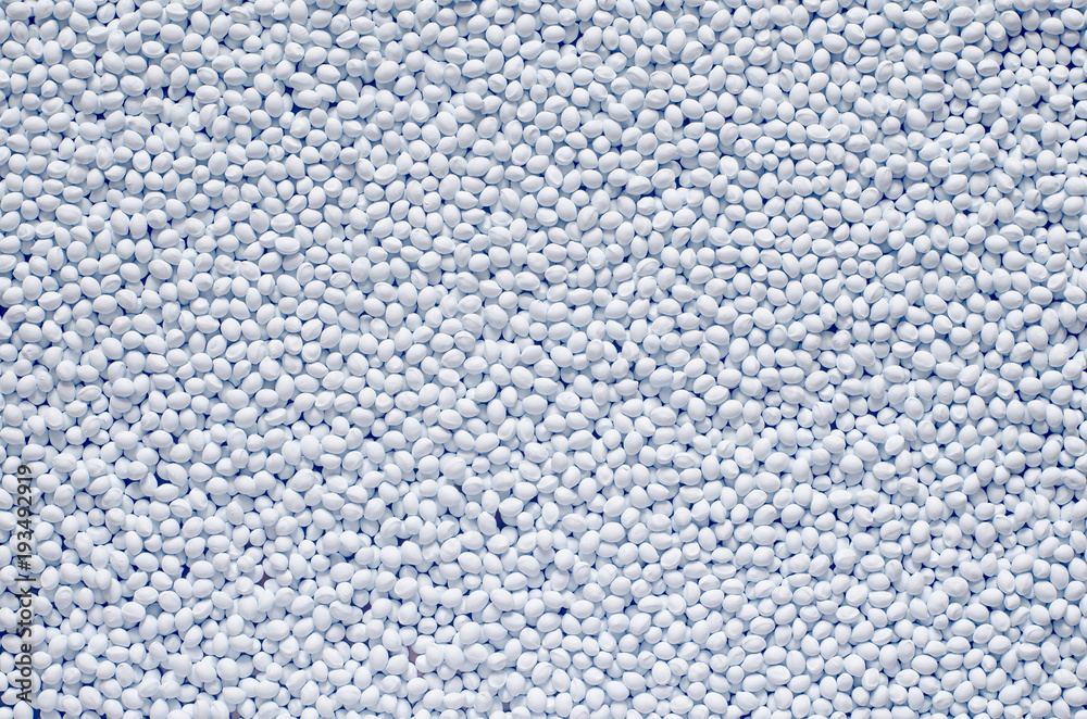 Polymer additive in granules, background texture