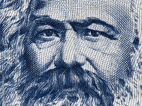 Karl Marx portrait on East German 100 mark (1975) banknote closeup macro, famous philosopher, economist, political theorist, sociologist and revolutionary socialist..