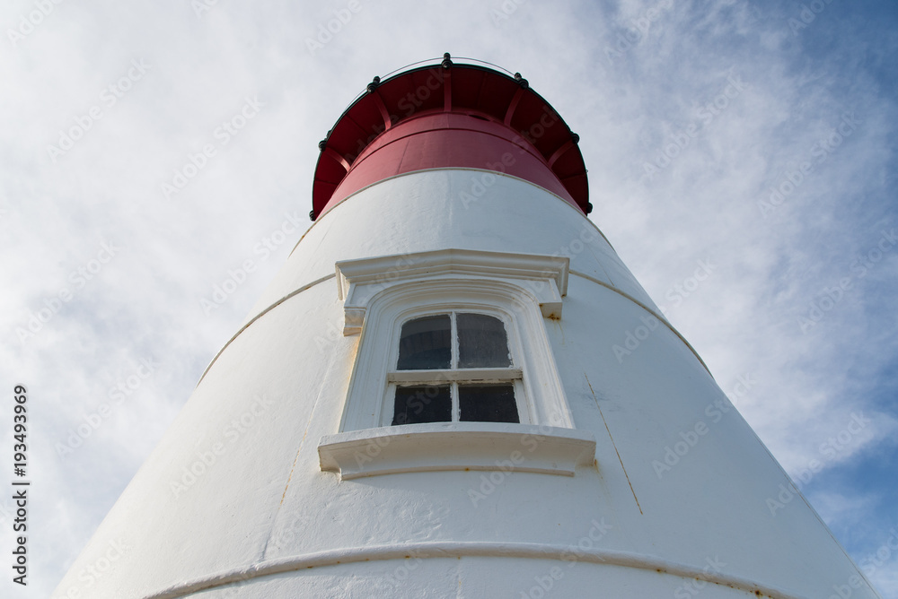 Close up of red and white lighthouse