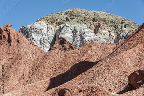 Rainbow Valley (Valle Arcoiris), in the Atacama Desert in Chile. The mineral rich rocks of the Domeyko mountains give the valley the varied colors from red to green. photo