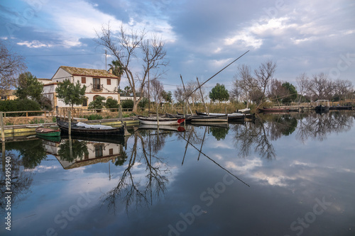 Albufera nature reserve in Catarroja Valencia Spain old traditional wooden boats. Latin sailing ships, in the harbor © Pb