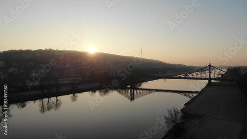 Aerial drone shot of Dresden Loschwitzer Bridge Blaues Wunder early morning with beautiful sunrise scenery Germany photo